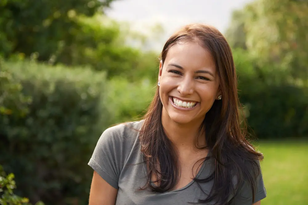 Woman smiling in recovery from mental health disorder through therapy services in New Jersey Woman smiling in recovery from mental health disorder through therapy services in New Jersey